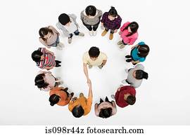 Handshake in circle of people