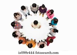 Man in circle of people