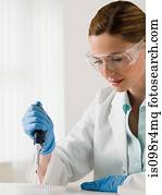 Female scientist and experiment