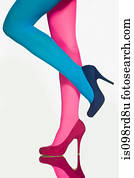 Woman with contrasting tights and shoes