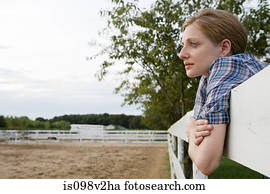 Mid adult woman in paddock