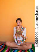 Woman drinking tropical fruit juice