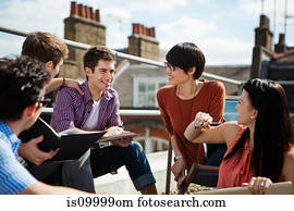 Group of people congratulating their friend