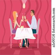 A couple having a romantic dinner at the restaurant A couple having a romantic dinner at the restaurant