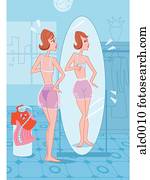 A woman looking in the mirror A woman looking in the mirror