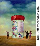 Three business people looking at a giant bottle of medicine Three business people looking at a giant bottle of medicine