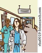 Two doctors standing in a hospital hallway