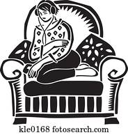 A teenage girl listening to music in an armchair