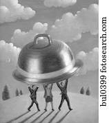 Three business people holding up a large silver platter