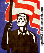 A man holding the American flag