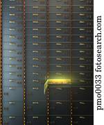 An open safety deposit box containing gold