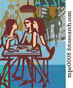 Three women having lunch in a restaurant