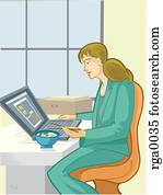 A businesswoman working during her lunchtime A businesswoman working during her lunchtime