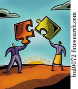 Two people putting puzzle pieces together