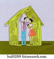 A couple with their baby standing under a house made of banknotes