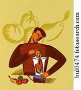 A man putting fresh fruit and vegetables into a blender