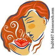 A woman smelling an aromatherapeutic flower A woman smelling an aromatherapeutic flower
