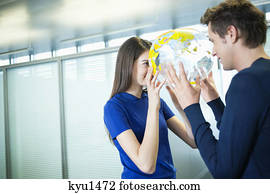 Business couple romancing in an office