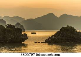Vietnam, Ha Long Bay at sunset, (UNESCO World Heritage)