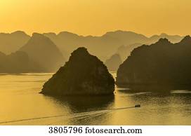 Vietnam, Ha Long Bay at sunset, (UNESCO World Heritage)