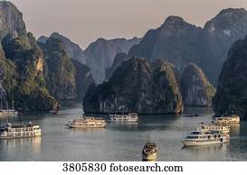 Vietnam, Ha Long Bay, cruise boat in the middle of islets (UNESCO World Heritage)