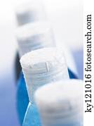 Bottles tops with waterdrops