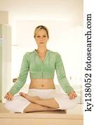 Young woman in yoga position