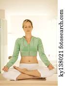 Young woman in yoga position