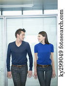 Business couple romancing in an office