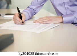 Man signing documents