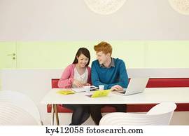 Business couple working in an office