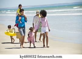 Families walking on the beach