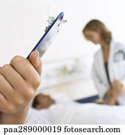 Doctors visiting patient