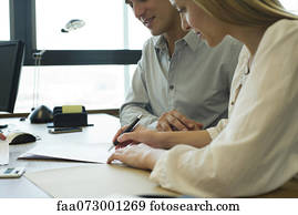 Couple signing contract