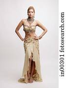 Young woman in Indian costume, hands on hips Young woman in Indian costume, hands on hips