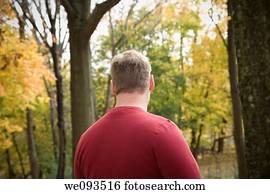 Young man in his backyard