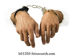 Close-up of hands in handcuffs