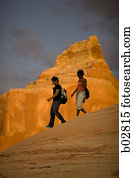 Profile of a young couple walking