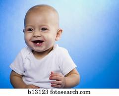 Baby smiling with copy space