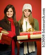 Family portrait with Christmas gifts Stock Image | a01363 | Fotosearch
