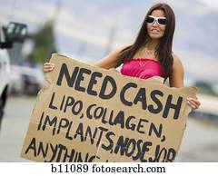 Woman standing on side of road soliciting cash