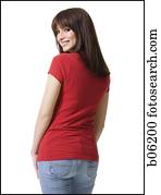 Woman looking back over her shoulder