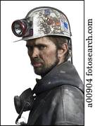 Mine worker with flashlight helmet