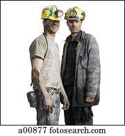 Two mine workers with flashlight helmets