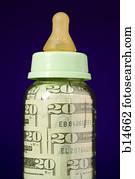 Baby bottle with US currency in it