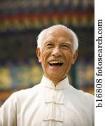 Man outdoors laughing