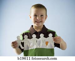 little boy with a paper cutout