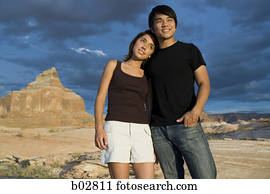 Low angle view of a young couple standing
