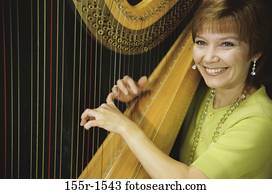 woman, smiling, playing, music, arts, entertainment woman, smiling, playing, music, arts, entertainment