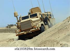 The Joint Explosive Ordnance Disposal Rapid Response Vehicle navigates over rough terrain.